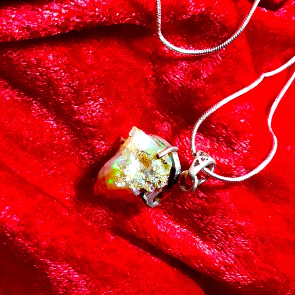 Beautiful free form opal silver necklace.